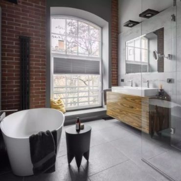 Chic Industrial Bathroom With Freestanding Tub