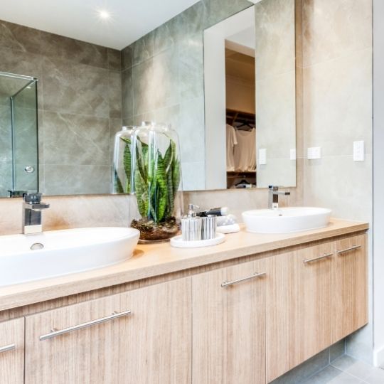 trend is to put in a big mirror on the wall to give your bathroom a modern look.