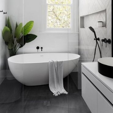 modern shower over bath with a minimalistic design