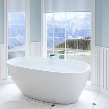 Beautiful Sholl Bath in the master bathroom with a scenic view
