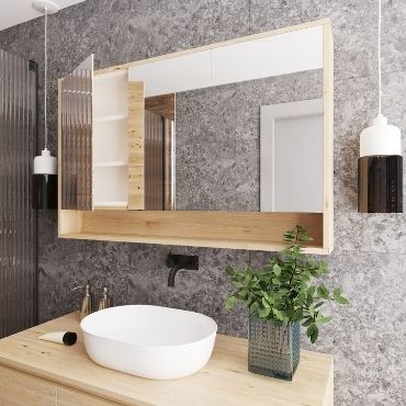 Textured bathroom with wooden vanity cabinet and white sink.