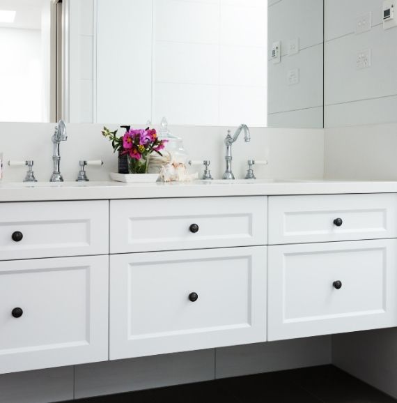 White Hudson Vanity with a large full-wall mirror