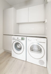 Laundry room with a washing machine and a dryer